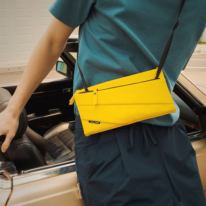 LIGHT Multipurpose Shoulder Bag - Yellow with ample space to accommodate your phone, keys, cards, and even a passport.